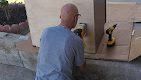 a man furnishing a wood