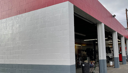 red white and gray brick walls of a shop