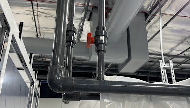 water pipe in a ceiling and ventilation