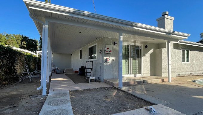 outside view of a white concrete house